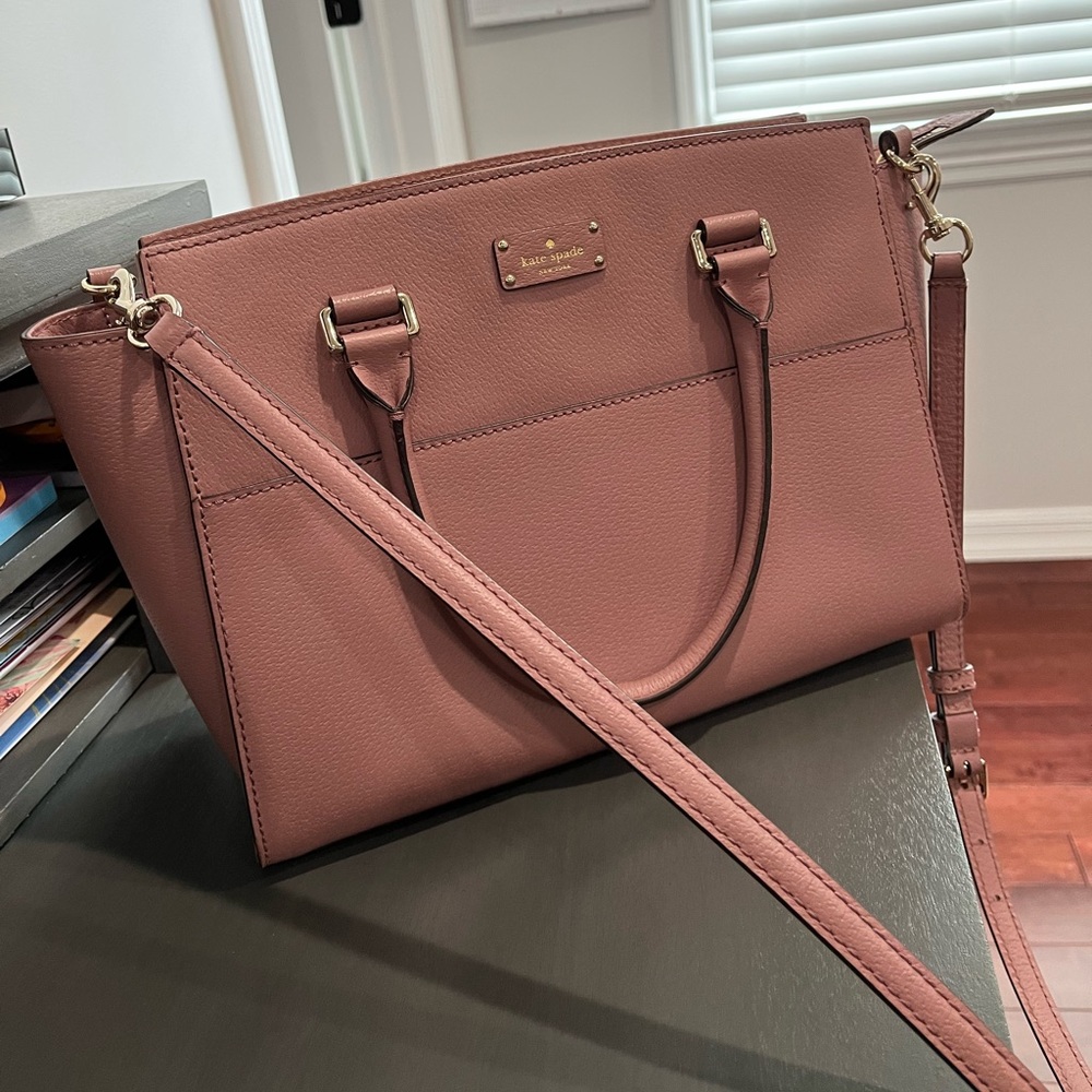 Pink Kate Spade purse. Comes with satchel strap.